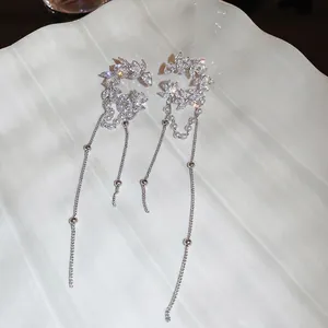 Elegant zircon crescent C-shape pearl tassel ear cuff with sparkling floral motifs