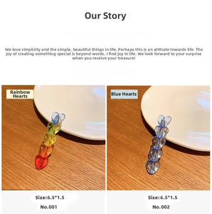 Macro view of transparent colorful heart hair clips showing 6.5x1.5cm dimensions