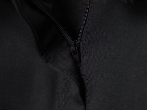 Macro shot of high-quality black functional zipper with durable metal puller