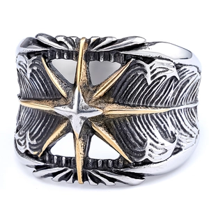 Vintage stainless steel ring with gold feather texture and center star pattern