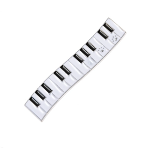 Unique piano keyboard hair clip with black and white enamel finish and cute paw print details