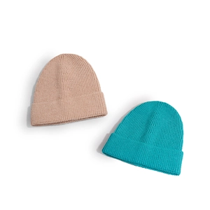 Solid color ribbed knit beanies in pink and blue, winter warm unisex casual style