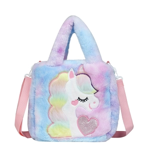 Rainbow plush unicorn handbag for kids with soft fur and sequin heart detail
