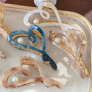 Elegant acrylic heart hair claws with pearl accent in multiple colors for women