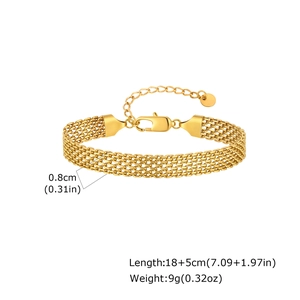 Detail of golden mesh bracelet showing the woven texture and lobster clasp with extender