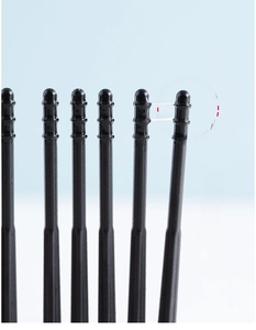 Macro detail of adhesive ear cleaners with spiral tips and non-slip texture design