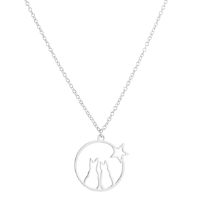 Minimalist stainless steel necklace featuring two cats and a star inside a hollow circular pendant