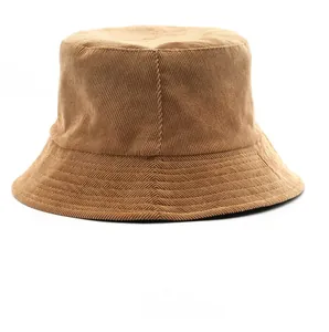 Close-up of brown corduroy bucket hat showing ribbed texture and casual retro style