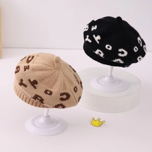 Autumn jacquard knitted beret for kids featuring stylish letter patterns in beige and black
