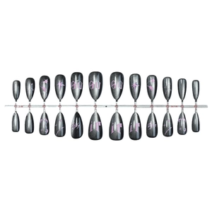 Handmade black cat eye press-on nails set with pink star and letter art patterns