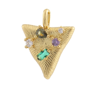 Detail of golden triangular charm with radial texture and four multicolor gemstones