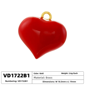 Detail of red brass heart pendant with gold ring, 18.5x19mm size and 2.6g weight