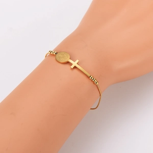 Minimalist gold stainless steel snake chain bracelet with religious medal and cross charm