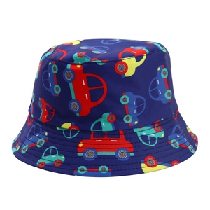 Detail of navy blue kids bucket hat with colorful cartoon car prints and fabric texture