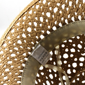 Detail of western straw hat inner band and 100% paper material label with size tag