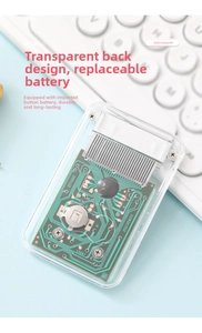 Detailed macro view of a mini calculator with transparent back showing internal PCB circuit