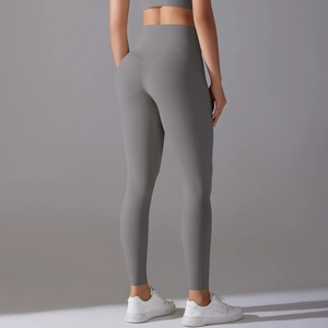 Detailed back view of high-waist grey yoga pants featuring seamless nude-feel fabric
