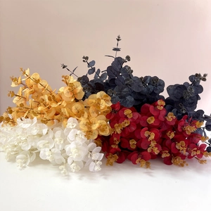 Artificial eucalyptus leaves in black, red, yellow and white for home decor