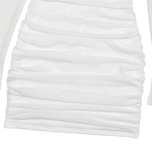 Close-up of white ruched dress showing the mesh fabric texture and pleated design