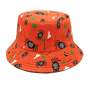 Detail of Halloween bucket hat featuring orange fabric with spider and pumpkin prints