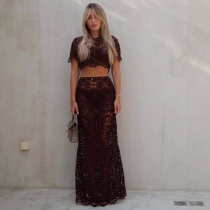 Detailed view of the dark brown floral lace two-piece set with long skirt and top