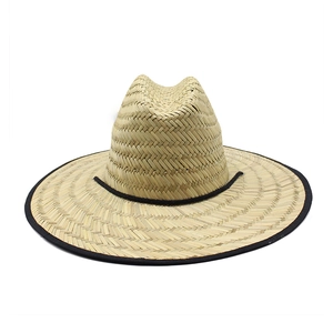 Natural straw wide brim sun hat with black trim for outdoor beach protection
