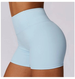 Detailed side view showing the high-waisted fit and elastic texture of baby blue yoga shorts