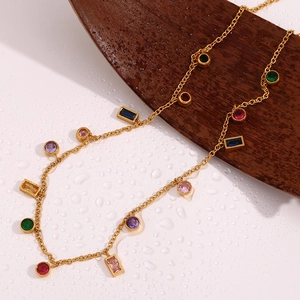 Detail of 18K gold-plated necklace featuring multi-colored geometric zircon stones