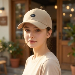 Classic beige men's baseball cap with SP patch for outdoor leisure shown on a model