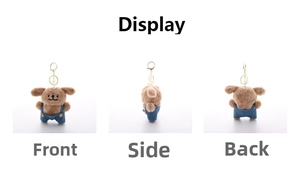 Detailed front side and back views of a plush puppy keychain in blue denim overalls