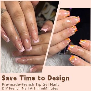 Macro detail of French tip press-on nails with pink glitter and orange gradient patterns
