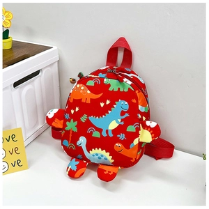 Detail of red toddler backpack with cartoon dinosaur prints and twin zipper closure