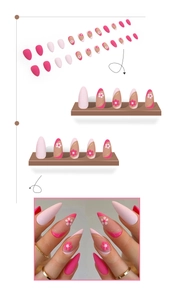 Detail view of pink almond press-on nails with floral art and French tip designs