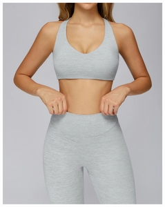 Macro shot of light grey brushed fabric texture on high-elastic yoga sports bra