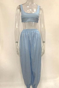 Close-up of sky blue striped two-piece set featuring cropped tank and jogger pants
