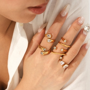 18K gold plated stainless steel rings set with sparkling zircon stones on model's hand
