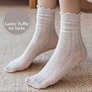Breathable white lace mesh crew socks with wavy cuffs and hollow knit design for women