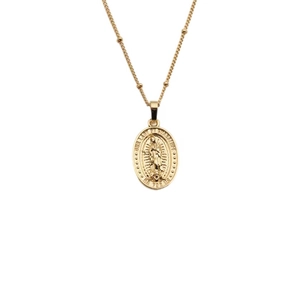 Detail of gold beaded chain necklace with Virgin Mary Guadalupe oval pendant engraving