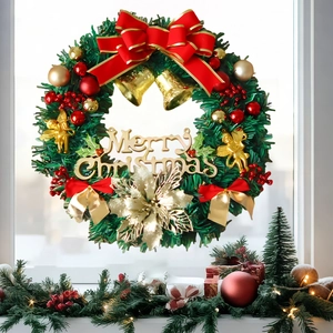 Detailed Christmas wreath featuring red bows and gold bells displayed on a window