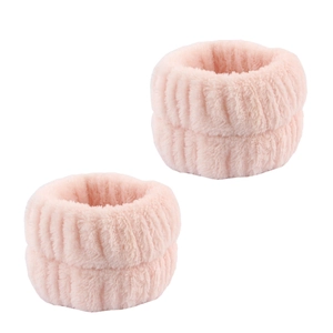 Detail of soft pink coral fleece wrist wash bands for preventing water flow while washing