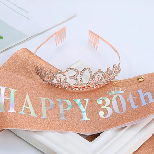 Detailed view of rose gold 30th birthday tiara with rhinestones and glitter sash set