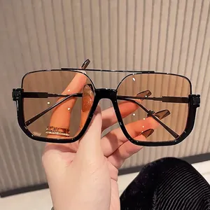 Retro oversized square sunglasses with black half-frame and translucent brown lenses