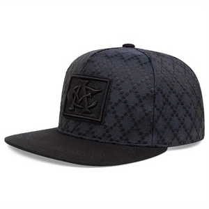 Detail of grey flat brim cap featuring textured diamond grid fabric and NY patch logo