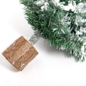 Mini green PVC flocked Christmas tree with snow effect and natural wooden base stand