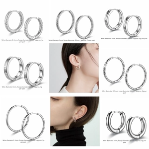 Multiple textured titanium steel hoop earrings showing patterns and sizes comparison