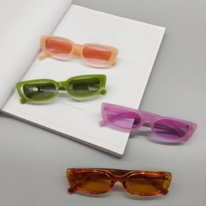 Chic Y2K square sunglasses in pastel pink, green, purple and amber on a magazine base