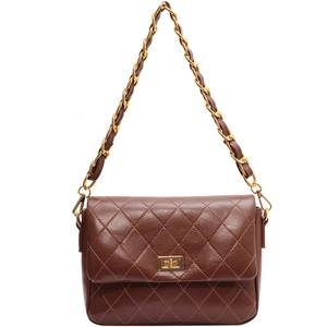 Brown quilted crossbody bag with golden chain strap and rectangular metal twist lock