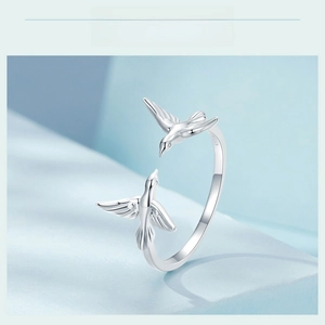 Detailed view of the S925 sterling silver flying bird ring with adjustable opening