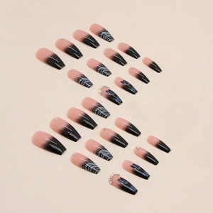 Long coffin fake nails with black gradient, butterfly motifs, and spider web nail art