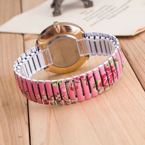 Women's quartz watch with floral rose pattern stretch strap and gold-tone case back